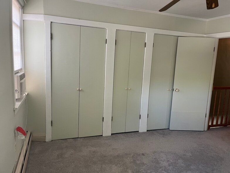 Main bedroom has plenty of storage including cedar closet - 136 N Green St