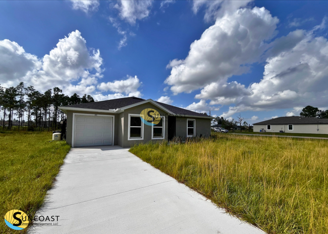 Building Photo - Move-In Ready Duplex in Lehigh Acres: Spac...