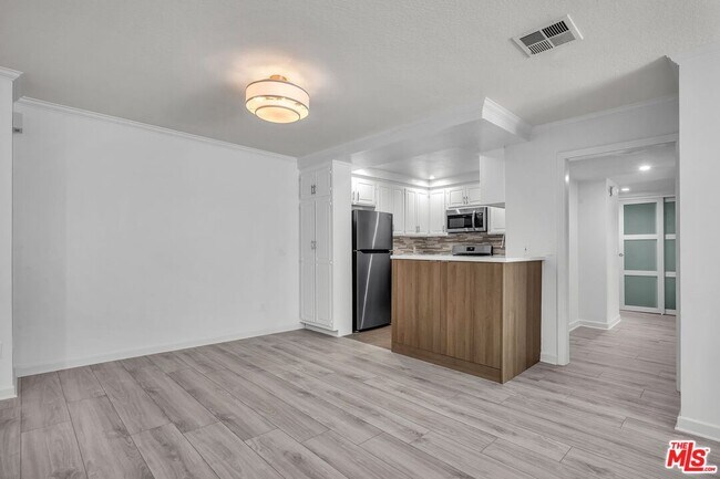 Building Photo - 8600 Tuscany Ave