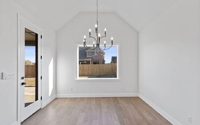 Building Photo - Gorgeous and impeccable custom home in Redbud Glen!