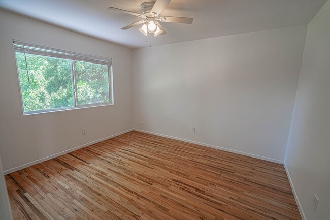 Building Photo - Spacious 4-Bedroom Home with Sun Room & Vi...
