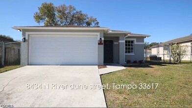 Building Photo - 8434 N River Dune St