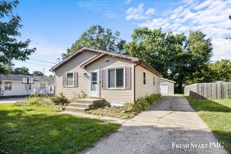 Building Photo - Bright & Spacious Family Home with Garage