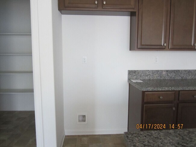 Building Photo - COOL POOL, PARKS AND NEAR NEW 3 BR PLUS DEN IN MEINFEE