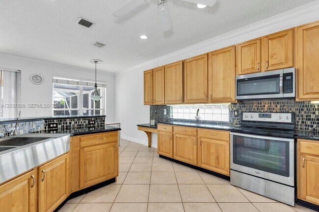 Building Photo - 12686 Little Palm Ln