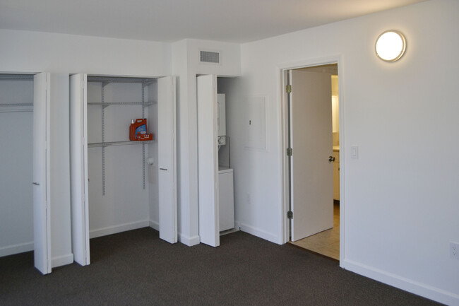 Main Bedroom with closets and laundry. - 452 S Main St