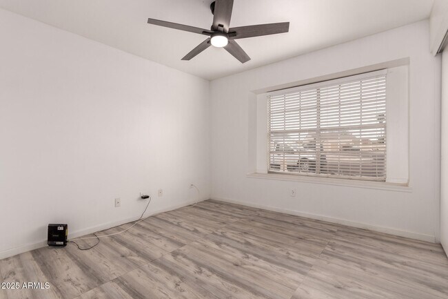 Building Photo - 6038 W Gelding Dr