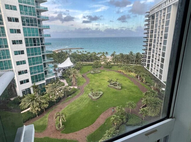 Building Photo - 10275 Collins Ave