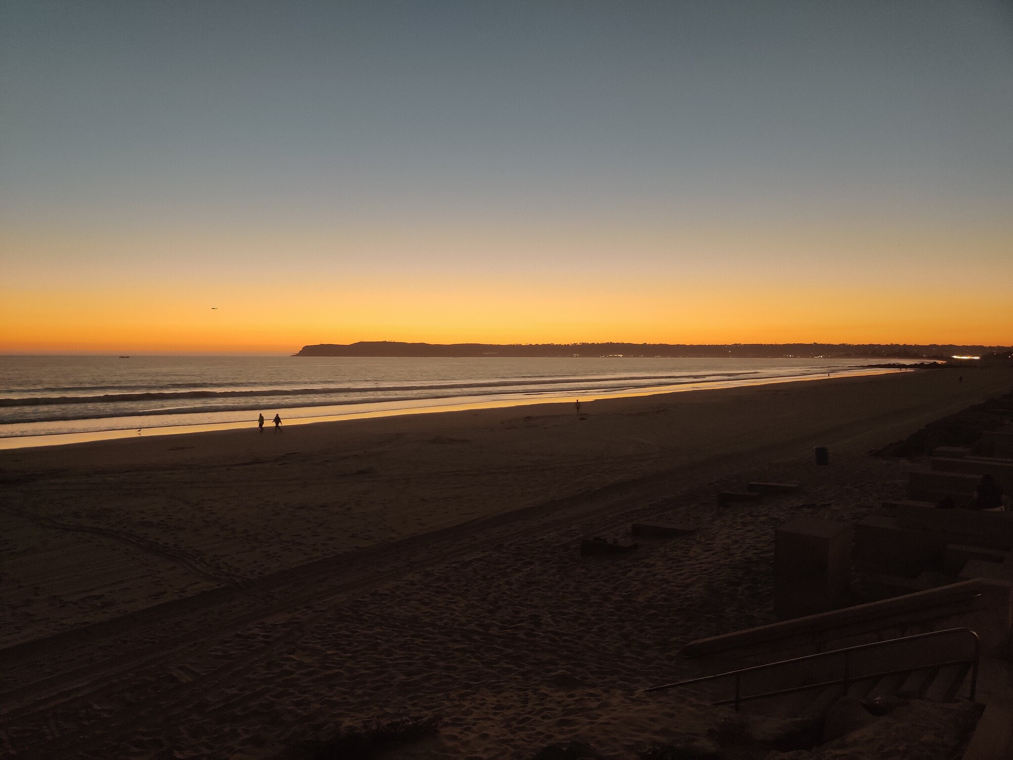 A sunset on the beach in front of our building - 1830 Avenida Del Mundo