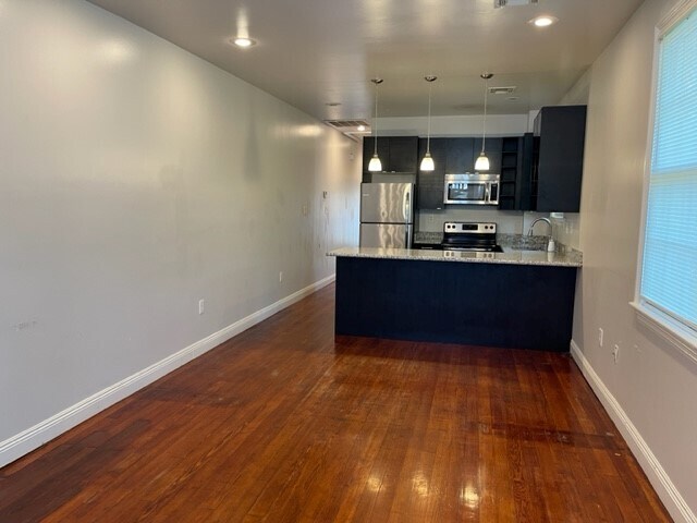 View from dining to kitchen area - 2016 Jena St