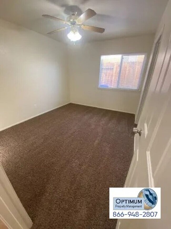 Building Photo - Spacious 4-Bedroom Home with 3-Car Garage & Downstairs Suite!