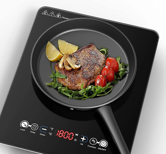 Sample photo pulled from the web of an induction cooktop. Heats very quickly. Great for cooking. - 3277 N Whitney Ave