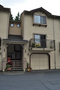 Building Photo - Charming Townhome in a Serene Wooded Setti...