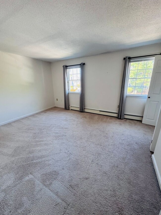Building Photo - Wonderful 2 Bedroom, 1.5 bathroom condo w/...