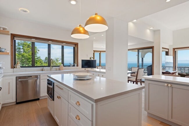 Building Photo - World-Class Ocean views abound with this American Riviera Gem!