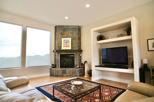 Building Photo - Mountain and City Views from this Furnishe...