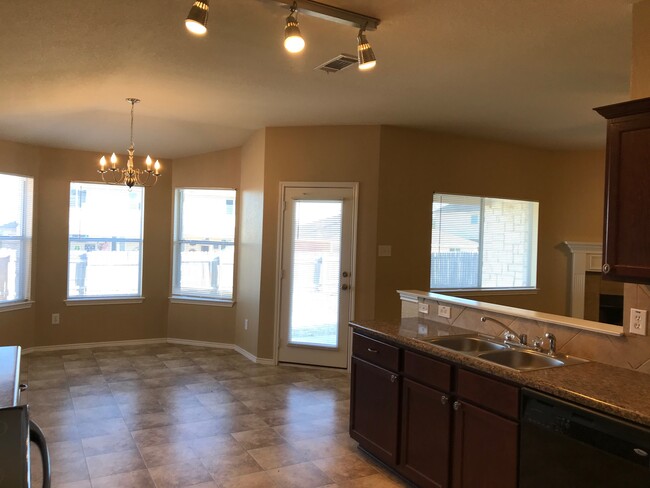 Kit view of open plan dining/LR - 6524 Cold Water Dr