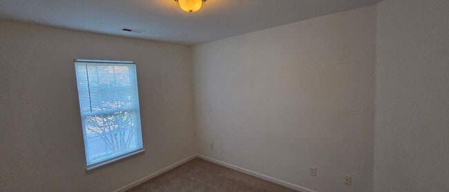 Building Photo - This phenomenal townhome is truly move-in ready!