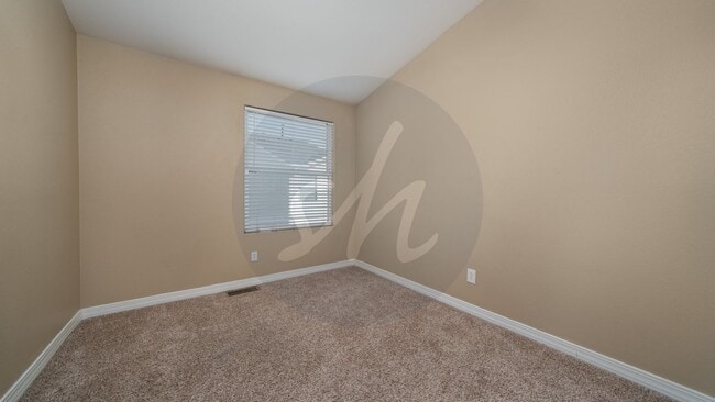 Building Photo - Spacious 3BR Townhome with 2-Car Garage & Private Covered Balcony