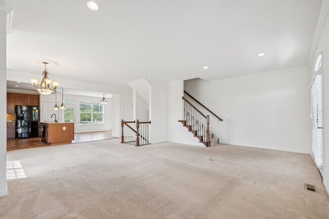 Building Photo - This beautifully maintained end-unit brick...