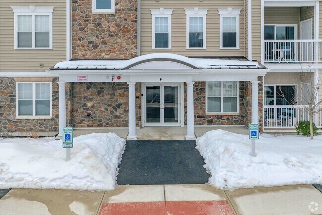 Building Entrance - Riverside Woods Condominiums