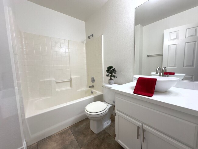 Building Photo - Beautiful SW Las Vegas Home. 3 Beds 3 Full Bath. Tiles Throughout.