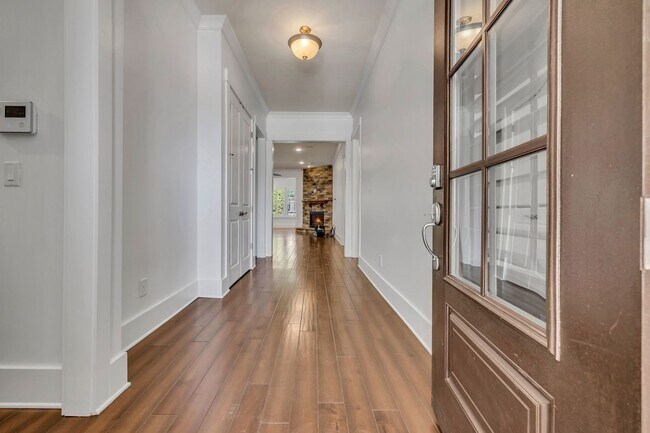 Building Photo - Beautifully maintained and move-in ready, this stunning mostly one-level all-brick home
