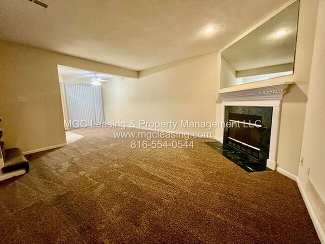 Building Photo - This spacious townhome is ready for you to...