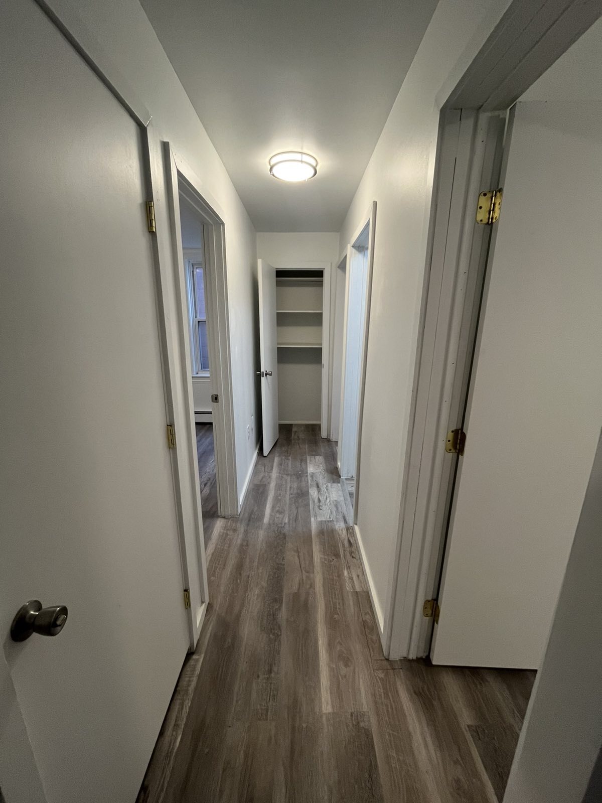 Hallway connecting the rooms and bathroom - 335 1st St