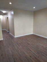 entry all with extra closet and storage - 6043 Romaine St - Off Market