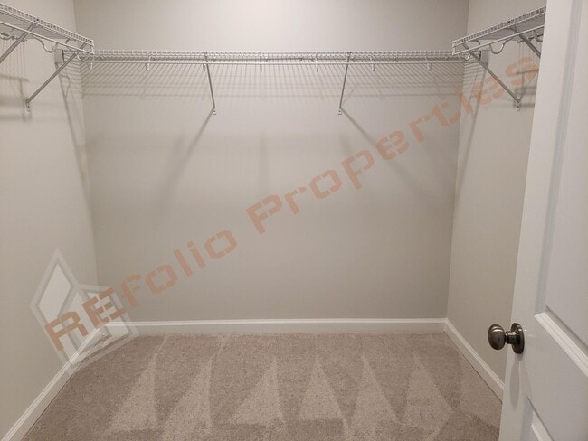 Building Photo - Brand New 3 BR 1-Car Garage Townhome in Do...