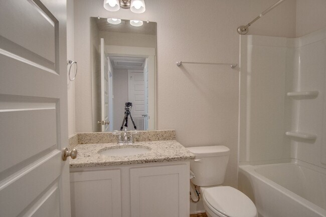 Building Photo - Spacious North Pensacola Townhome Featuring Modern Finishes, Granite Kitchen, Private Garage, Com...