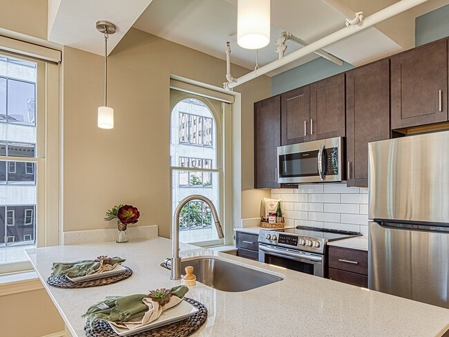 Kitchen islands and stainless appliances - Stumpf Flats on Main