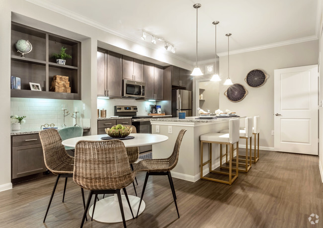 Dining Room, Kitchen, Laundry Room, and Built-In Desk with Bookshelves - Cardiff at Louetta Lakes