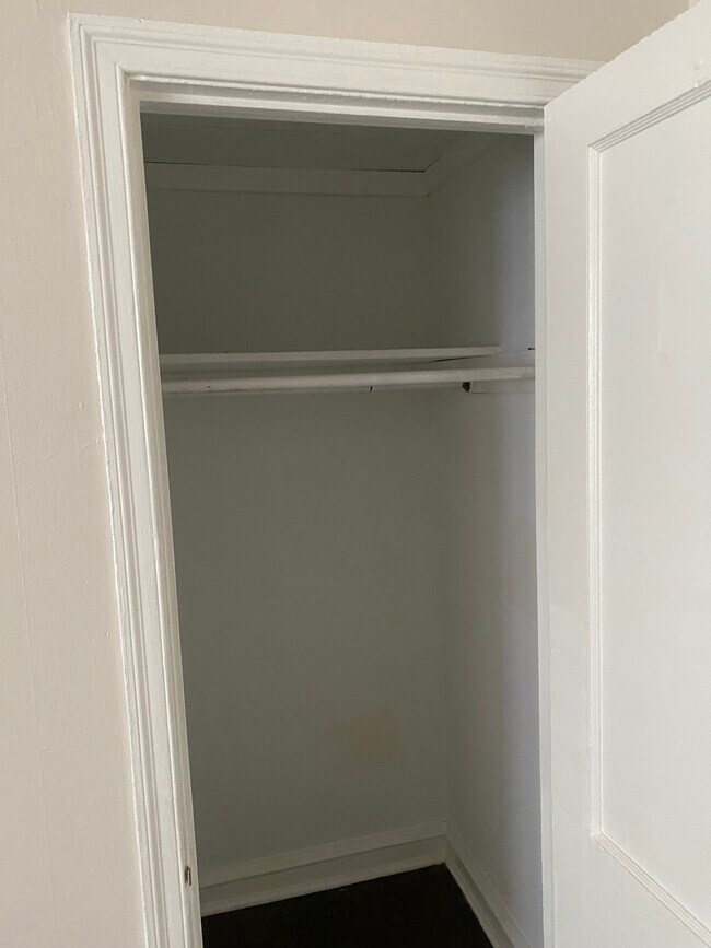 Large deep bedroom closet. - 114 E Main St