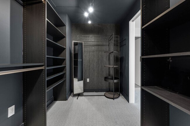 Building Photo - “Sleek Design Meets Walkable Downtown Livi...