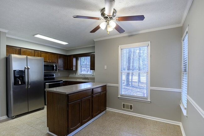 Building Photo - Move-In Ready Brick Ranch on Wooded Acre in Hampton Woods!