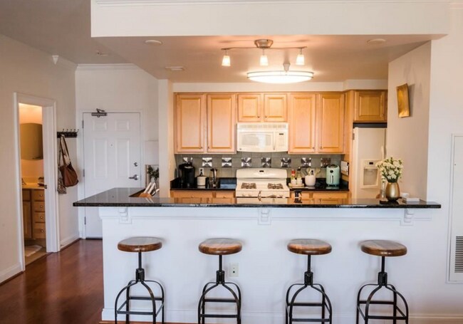 Granite kitchen with half bath - 123 College Pl