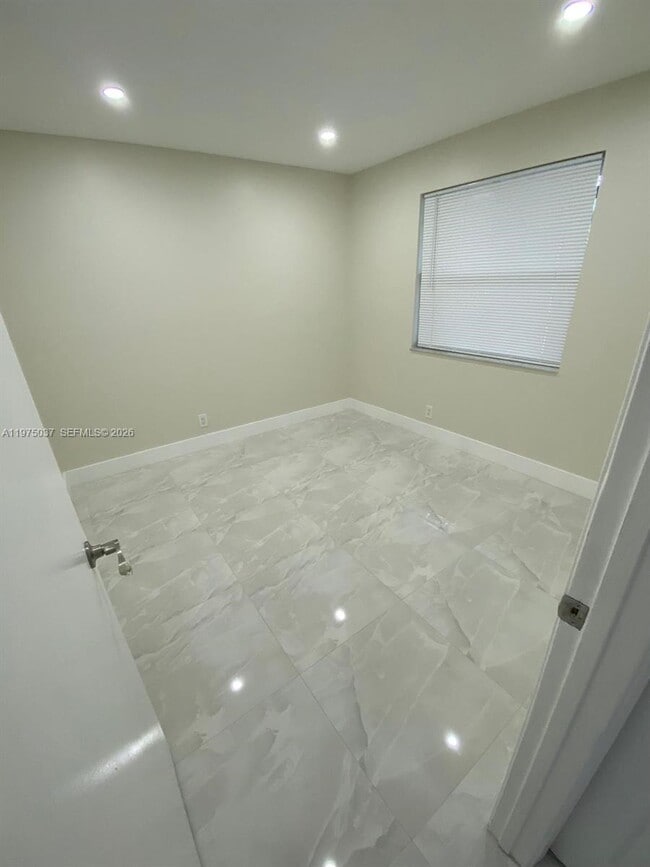 Building Photo - 8830 Royal Palm Blvd