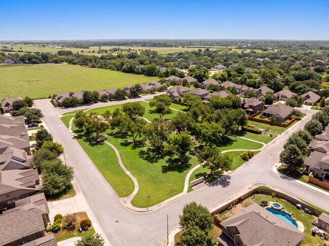 Building Photo - No Rear Neighbors, 3 Car Garage, a Chef's Kitchen, and Room for Everyone