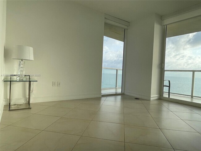 Building Photo - 16699 Collins Ave