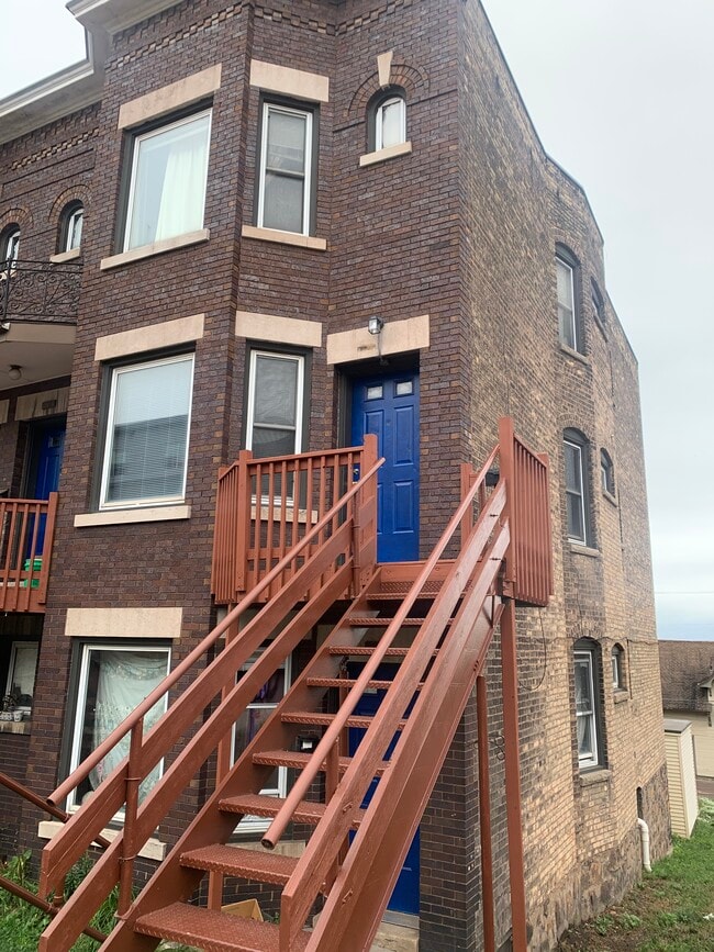 Building Photo - 122-126 W 4th