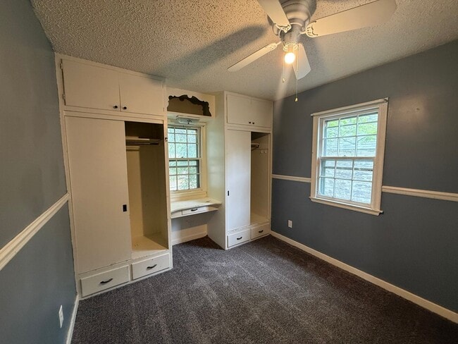 Building Photo - Two bedroom, One and half bathroom house, with additional living room, and bonus room!