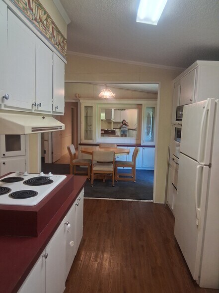 Dining area from kitchen - 11900 SW 121st Ave