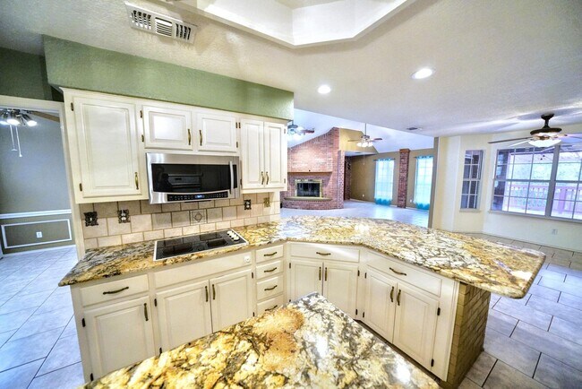 Building Photo - Executive Home in Greenshire with Luxurious Updates and Spacious Outdoor Living - Agent Commissio...