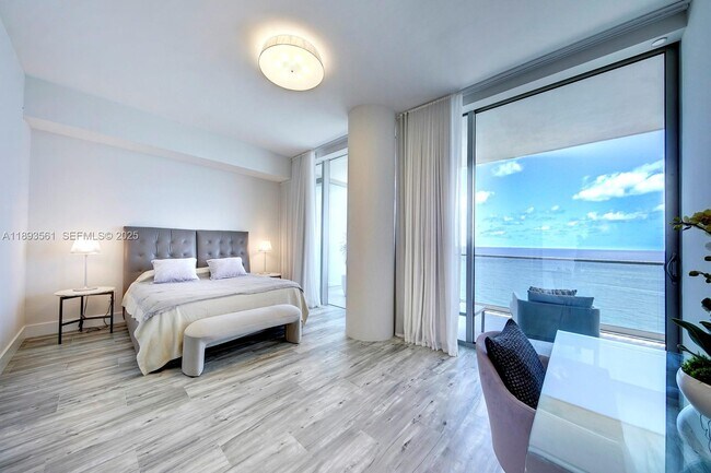 Building Photo - 10203 Collins Ave