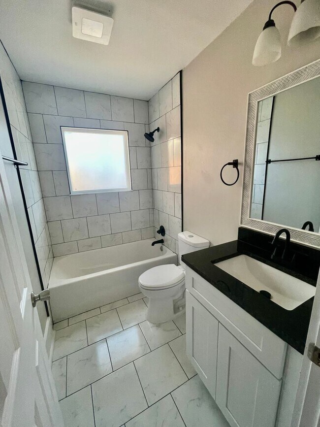 Building Photo - Welcome to Burgess2937, A Newly renovated charming 2-bedroom, 1-bathroom Duplex located in the vi...