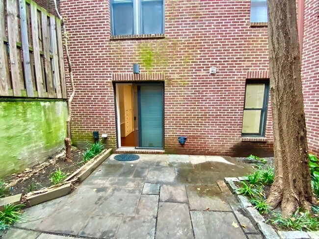 Building Photo - SAVE OVER $200!* Dupont Circle 1 Bedroom Charmer with Patio, Fireplace, Central Air, Washer/Dryer!