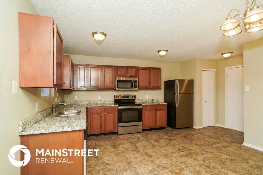 Building Photo - 9040 Wandflower Dr