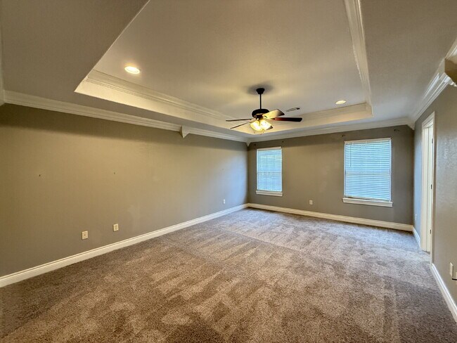 Building Photo - Great Outdoor Living Space / 4BR with 3 Ca...